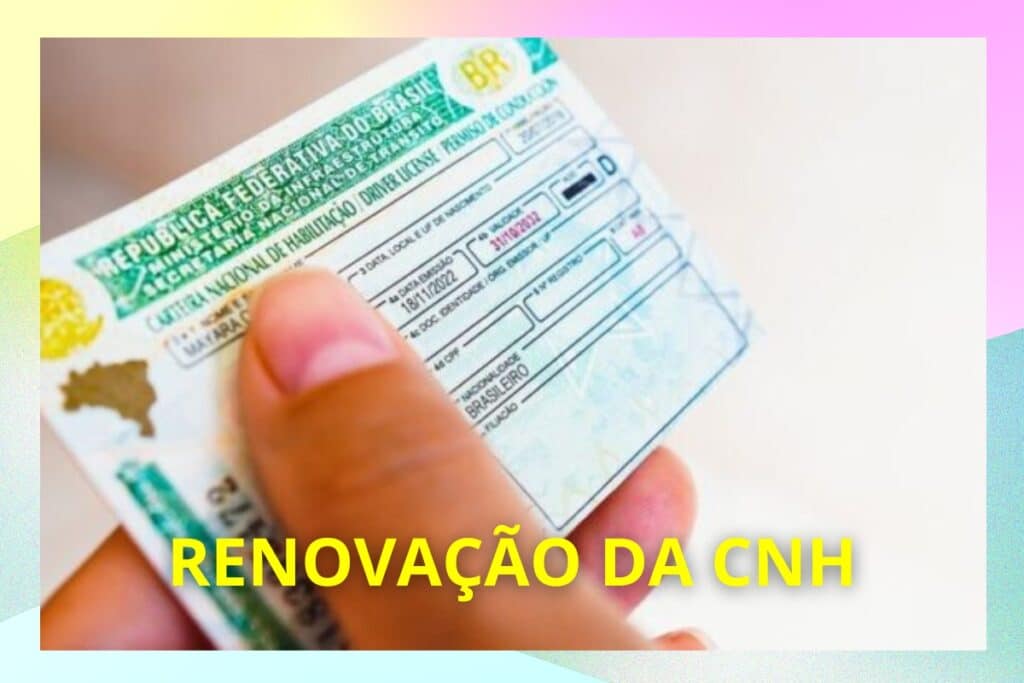 Mão segurando Carteira Nacional de Habilitação do Brasil.